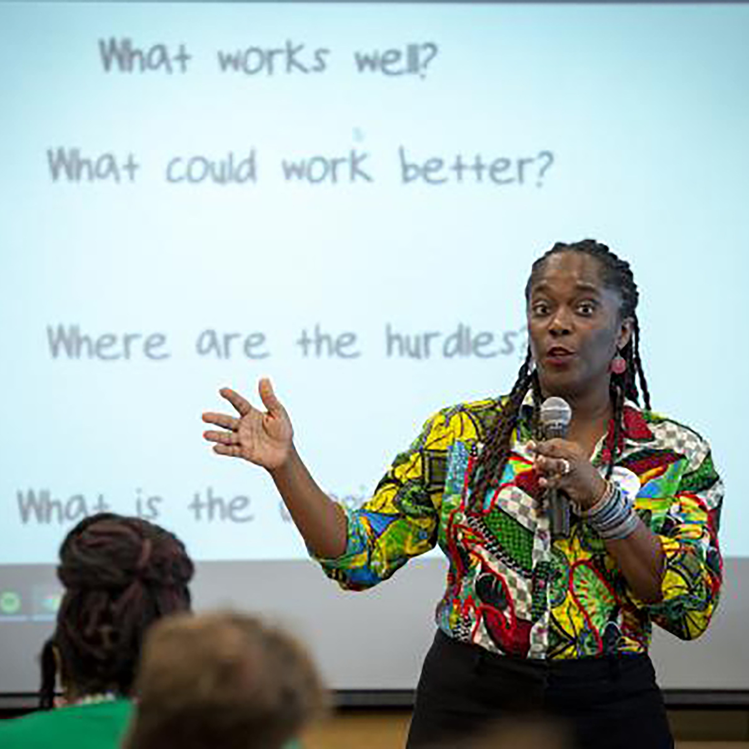 Photo of Dr. Lesley Ann lecturing 