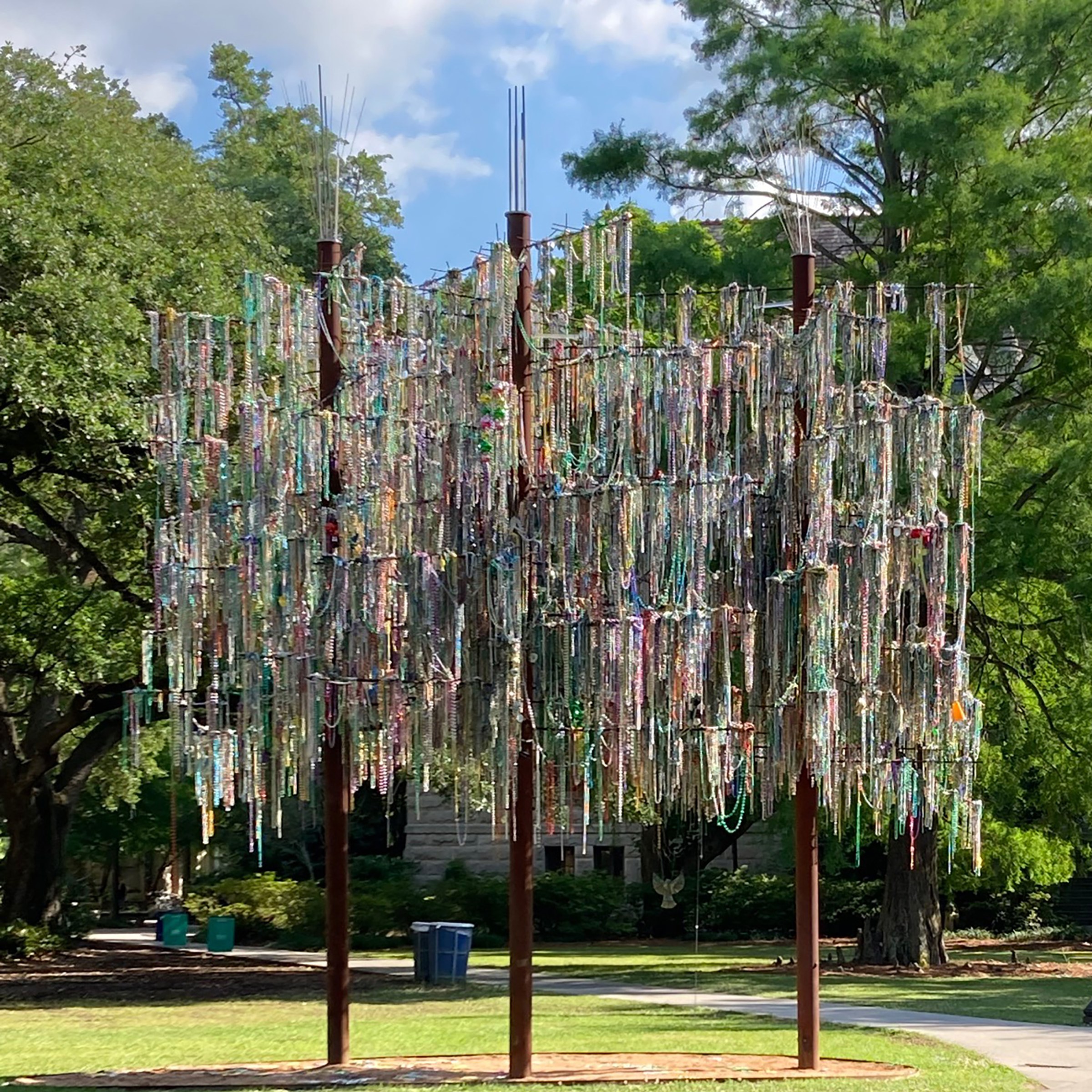 Photo of three new bead tree sculptures on Tulane's uptown campus