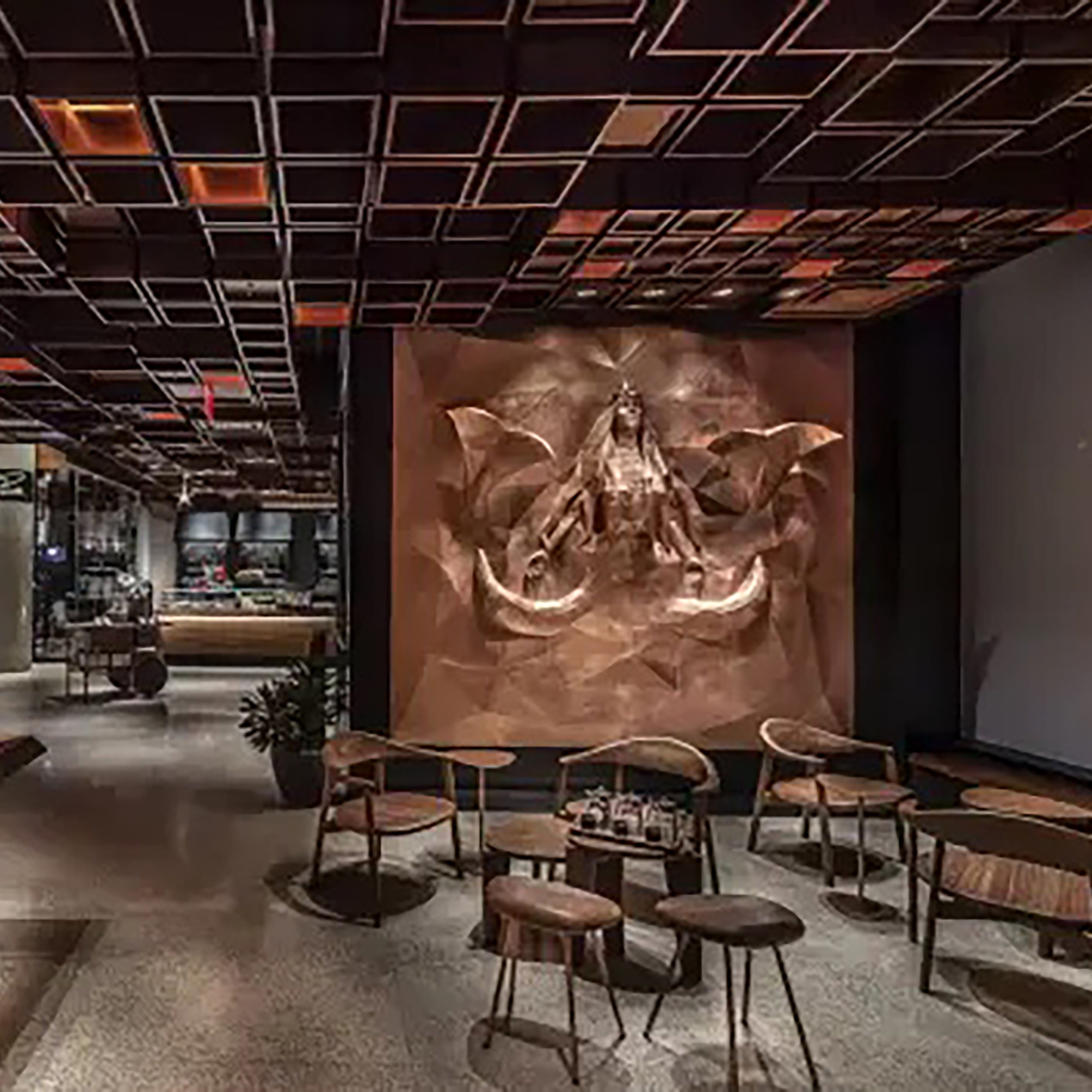 Photo of modern room with brown and gold accents and features