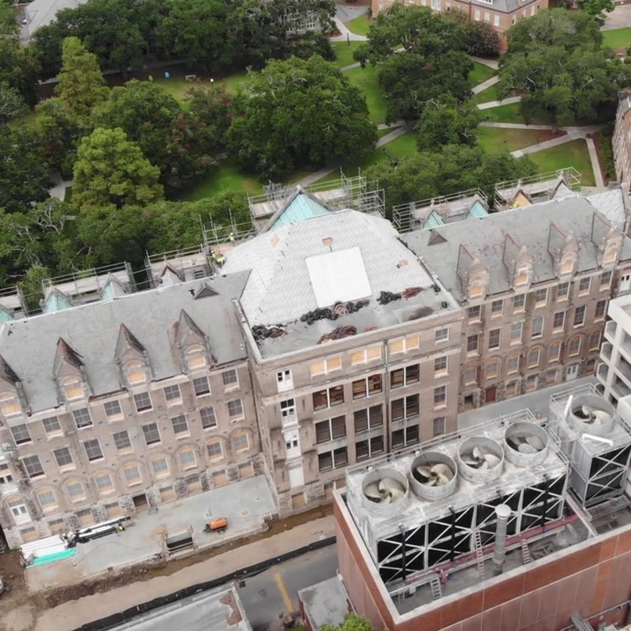 aerial drone view looking down at the back, or east, facade of Richardson Memorial Hall while under renovation.