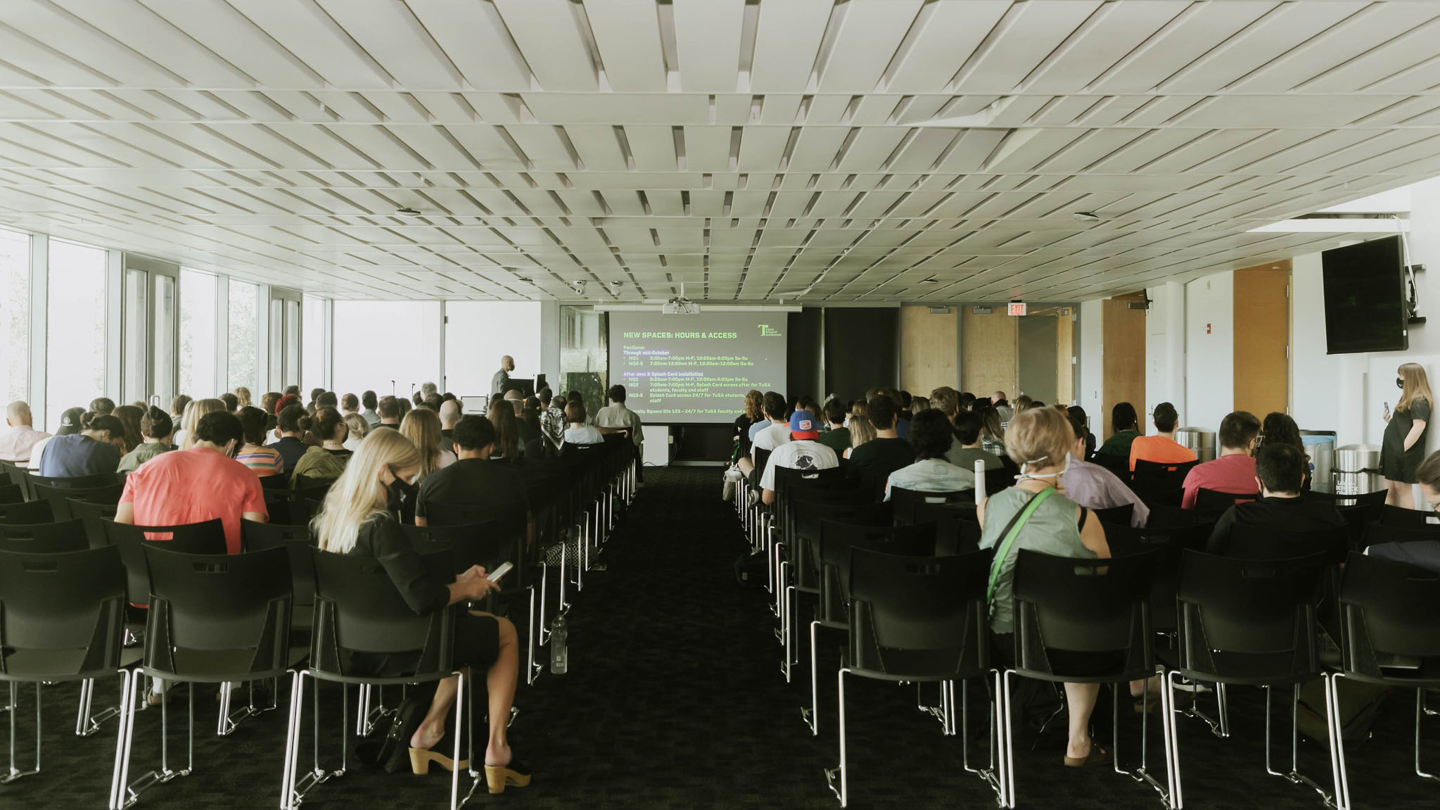 Image of students, faculty, and staff in an all school meeting