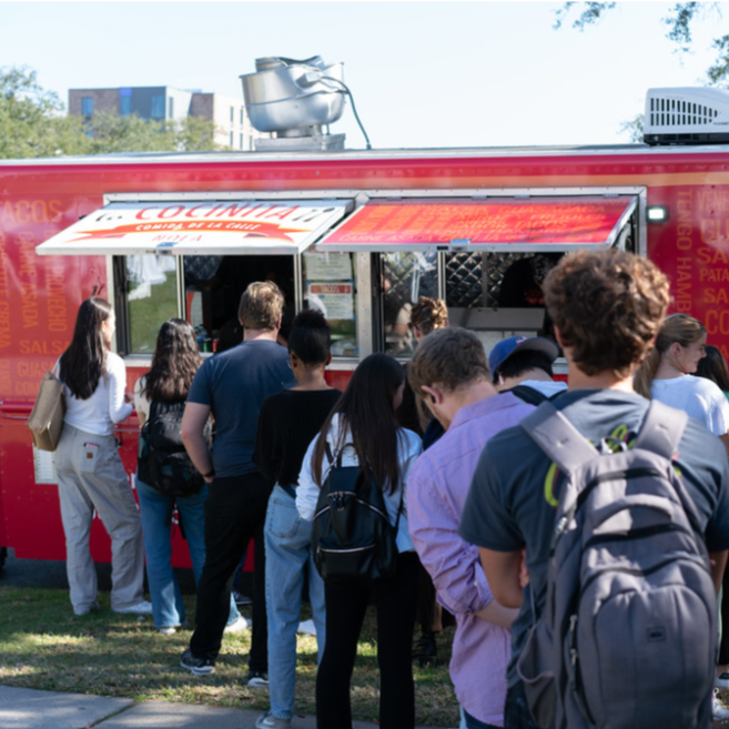 Line of people waiting for a food truck 