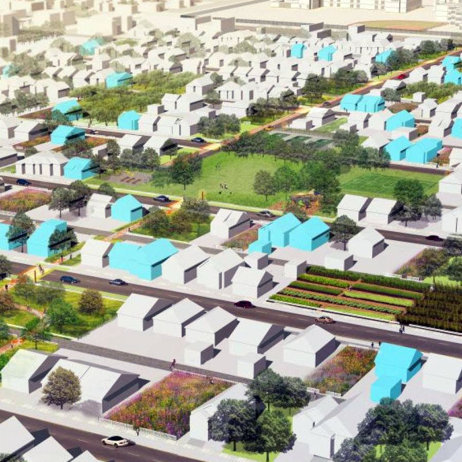 overhead view of a city with blue and white houses 