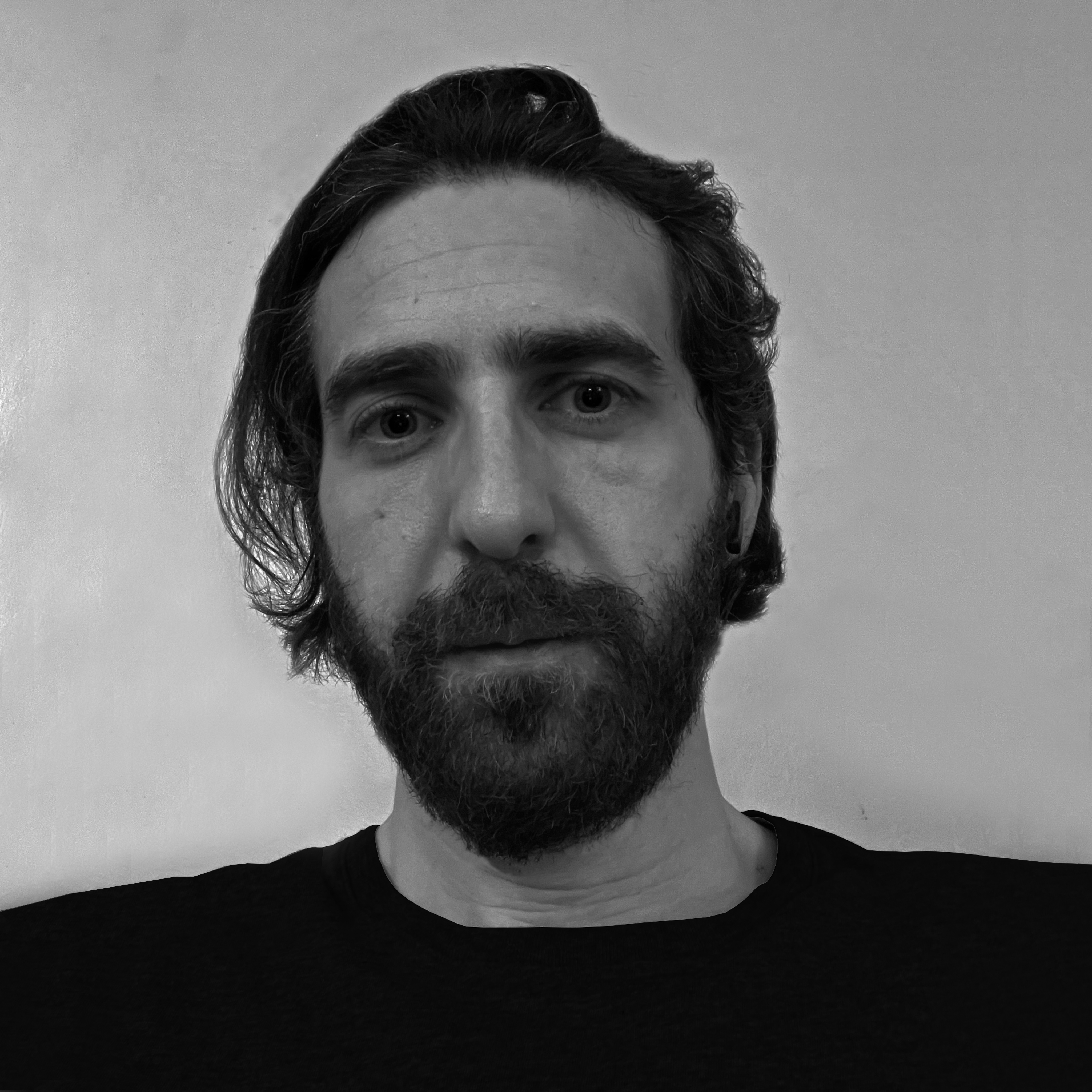 headshot of Emek Erdolu