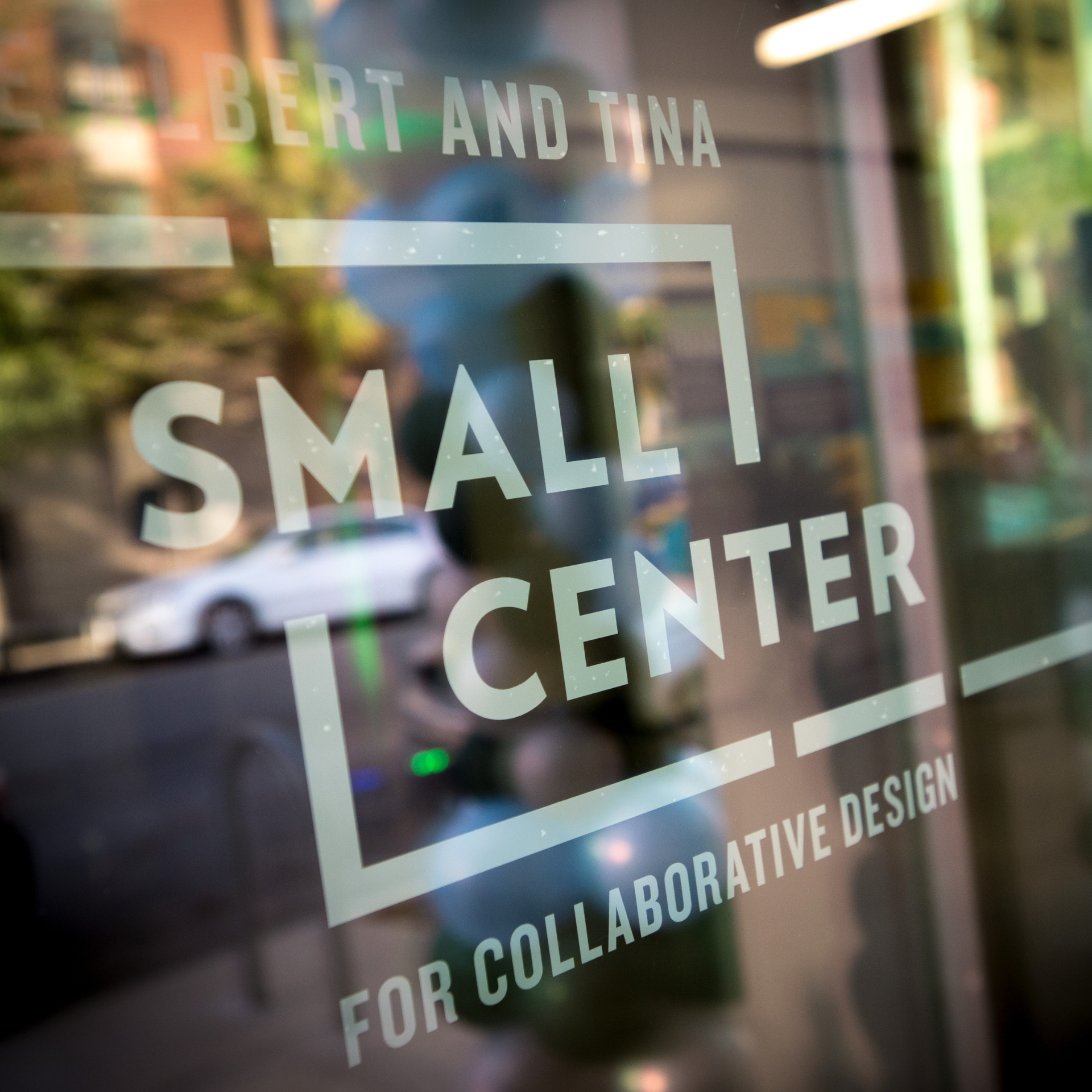 Close-up of front glass window door of the Albert and Tina Small Center.