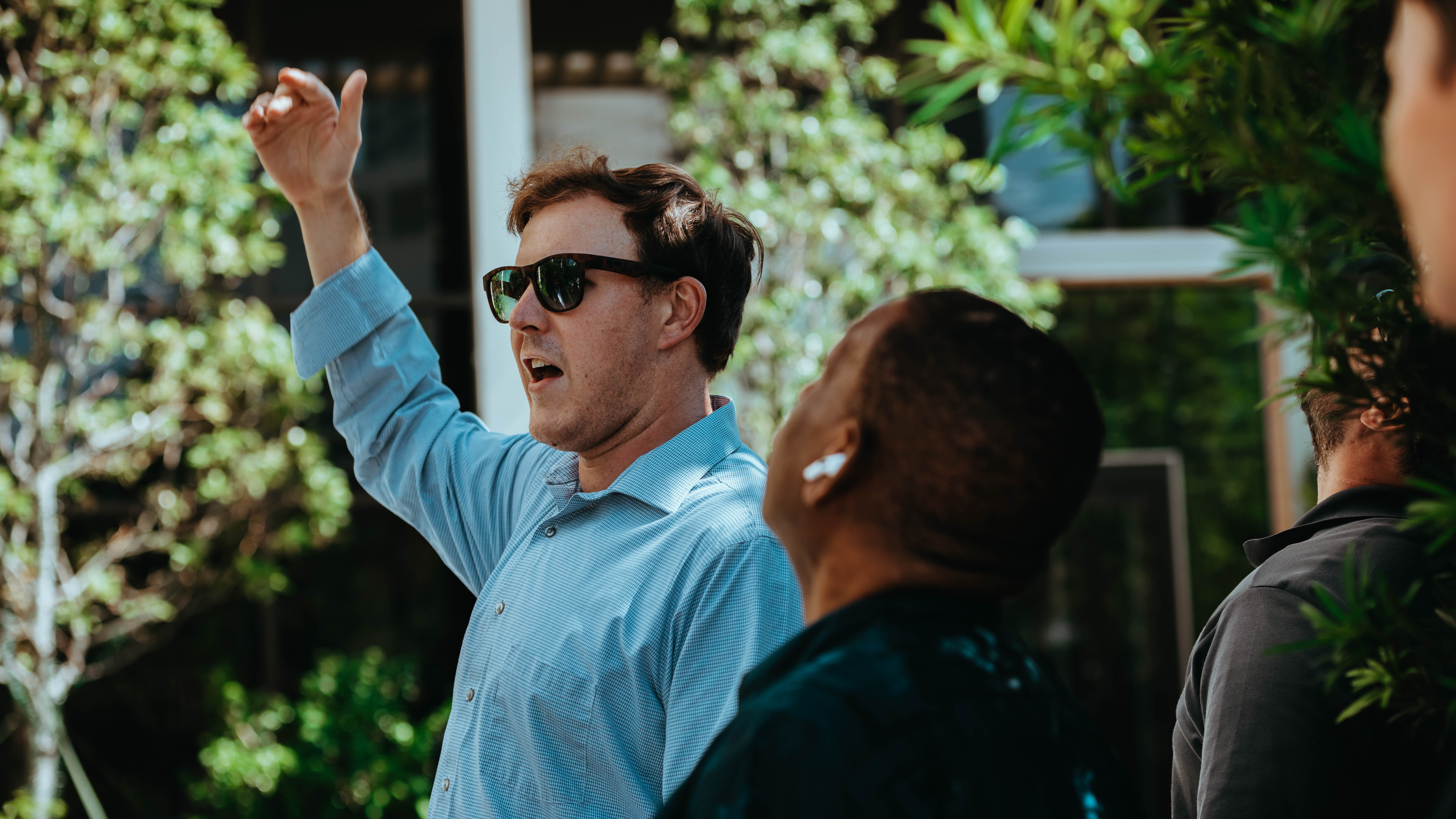 Image of a professor talking to students