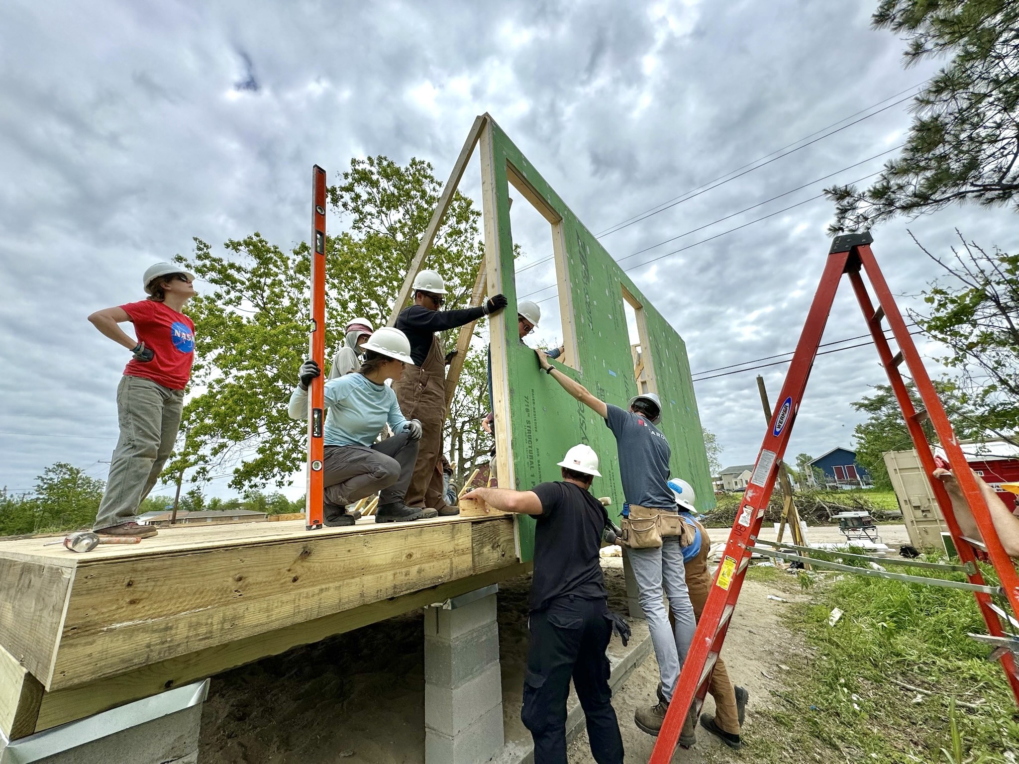 Students construct a house as part of the URBANbuild program