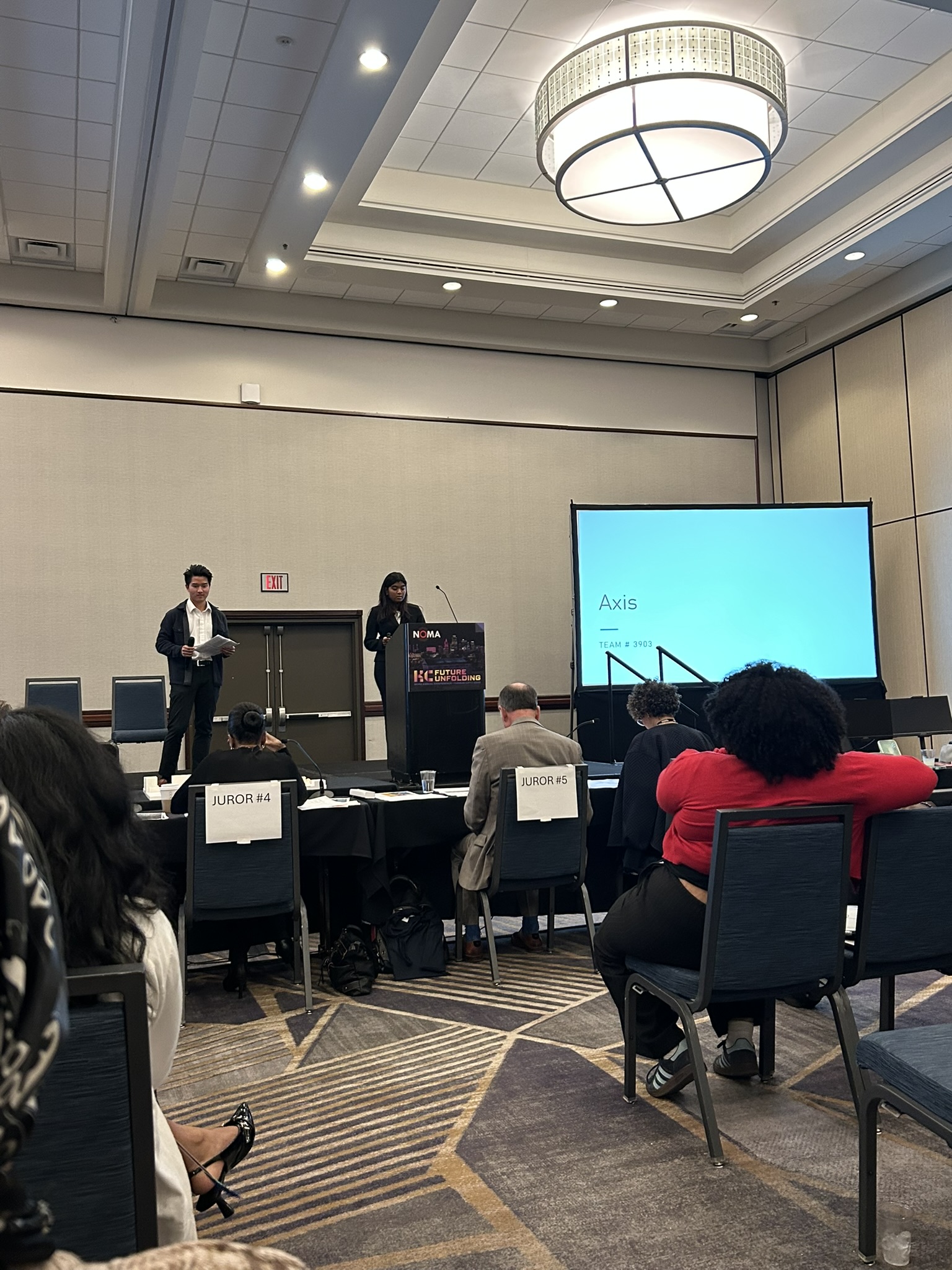 Students Diya and Dang present AXIS 