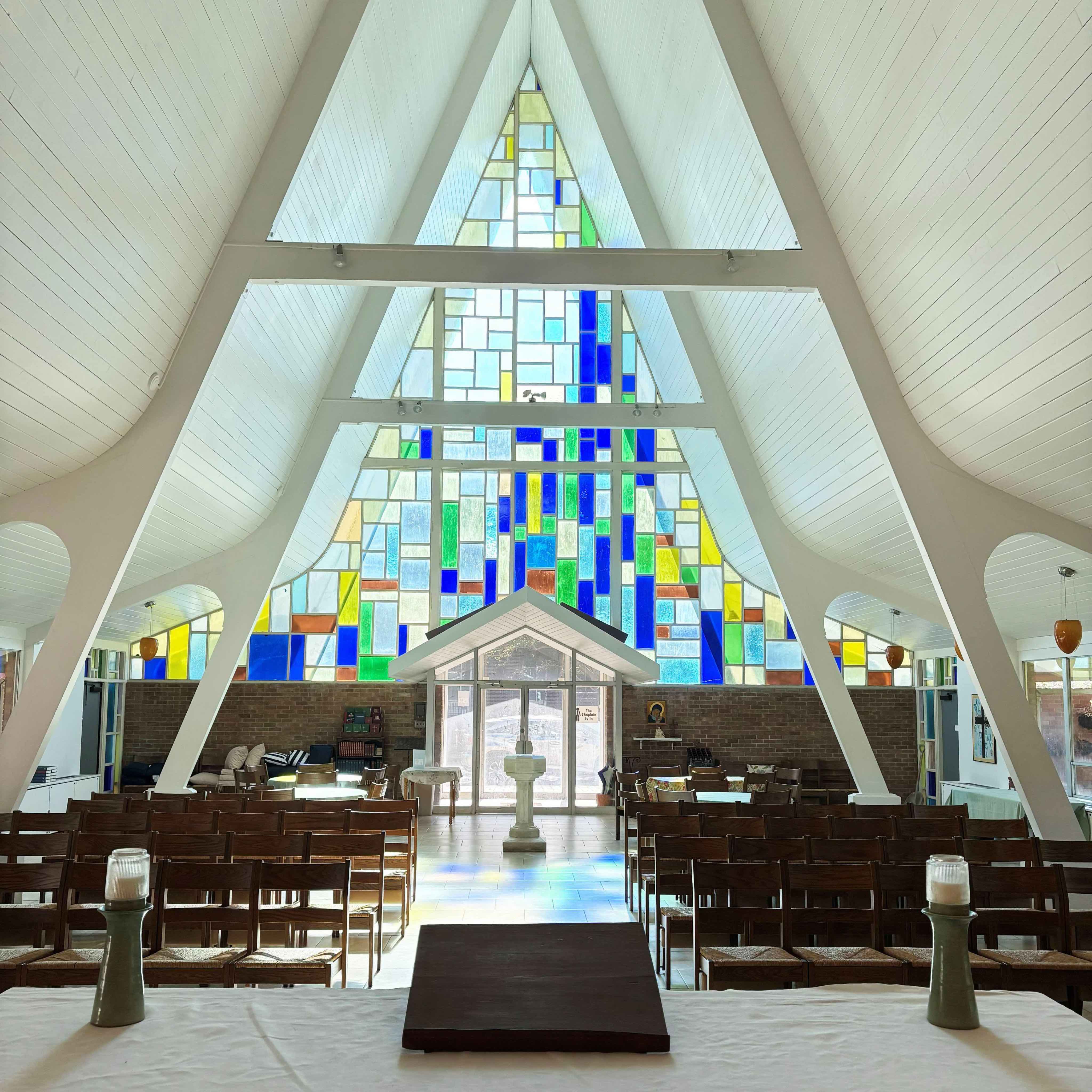 Interior of site of worship with stained glass 