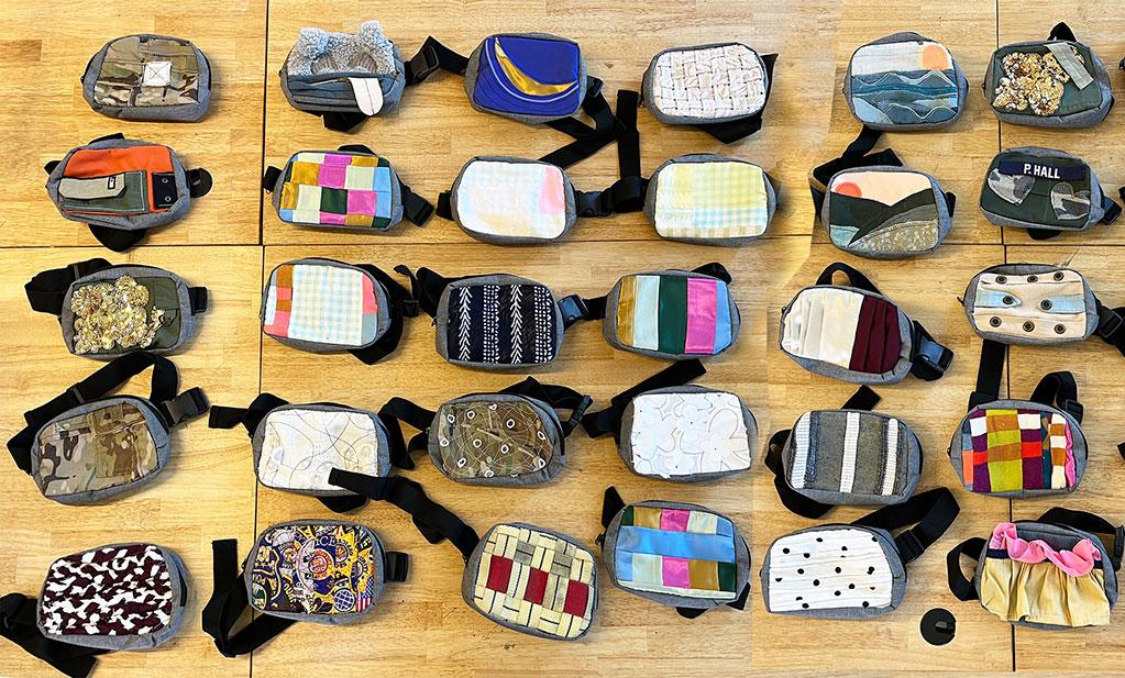 Fanny packs made from reclaimed materials in Prof. Dunn's textiles lab