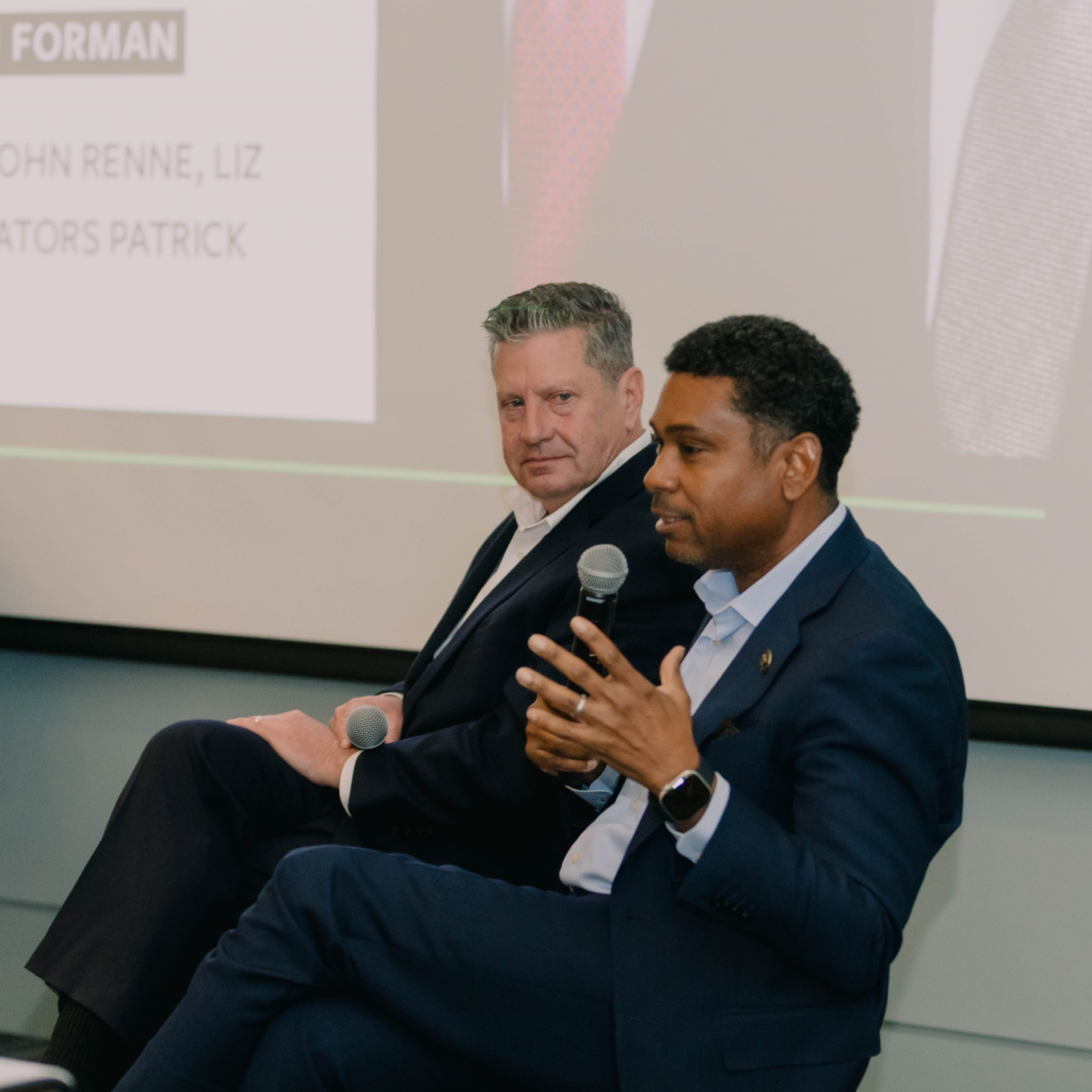 An image of two senators at the Across the Aisle event hosted by the school