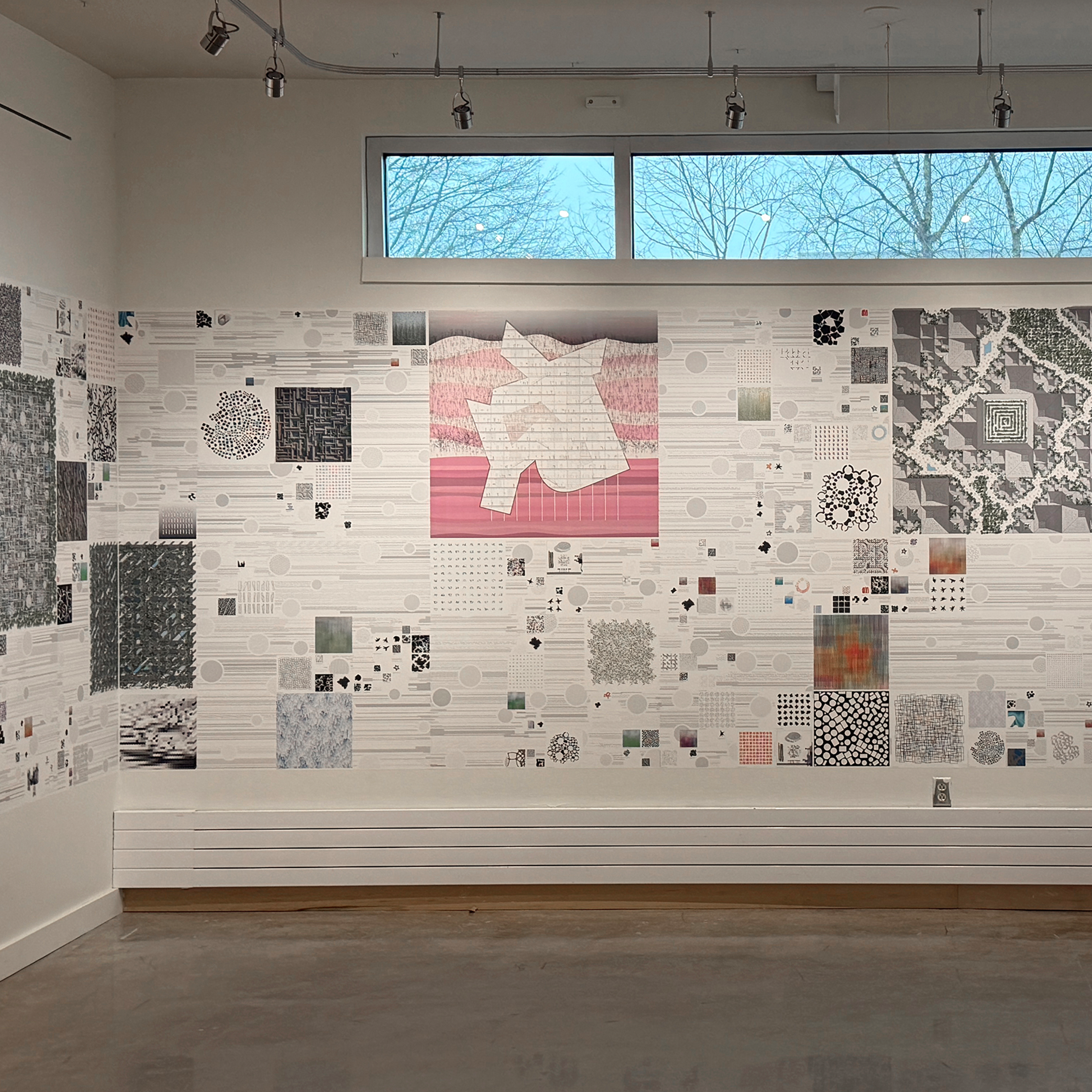 Corner of room showing part of Adam Marcus's exhibition on the walls