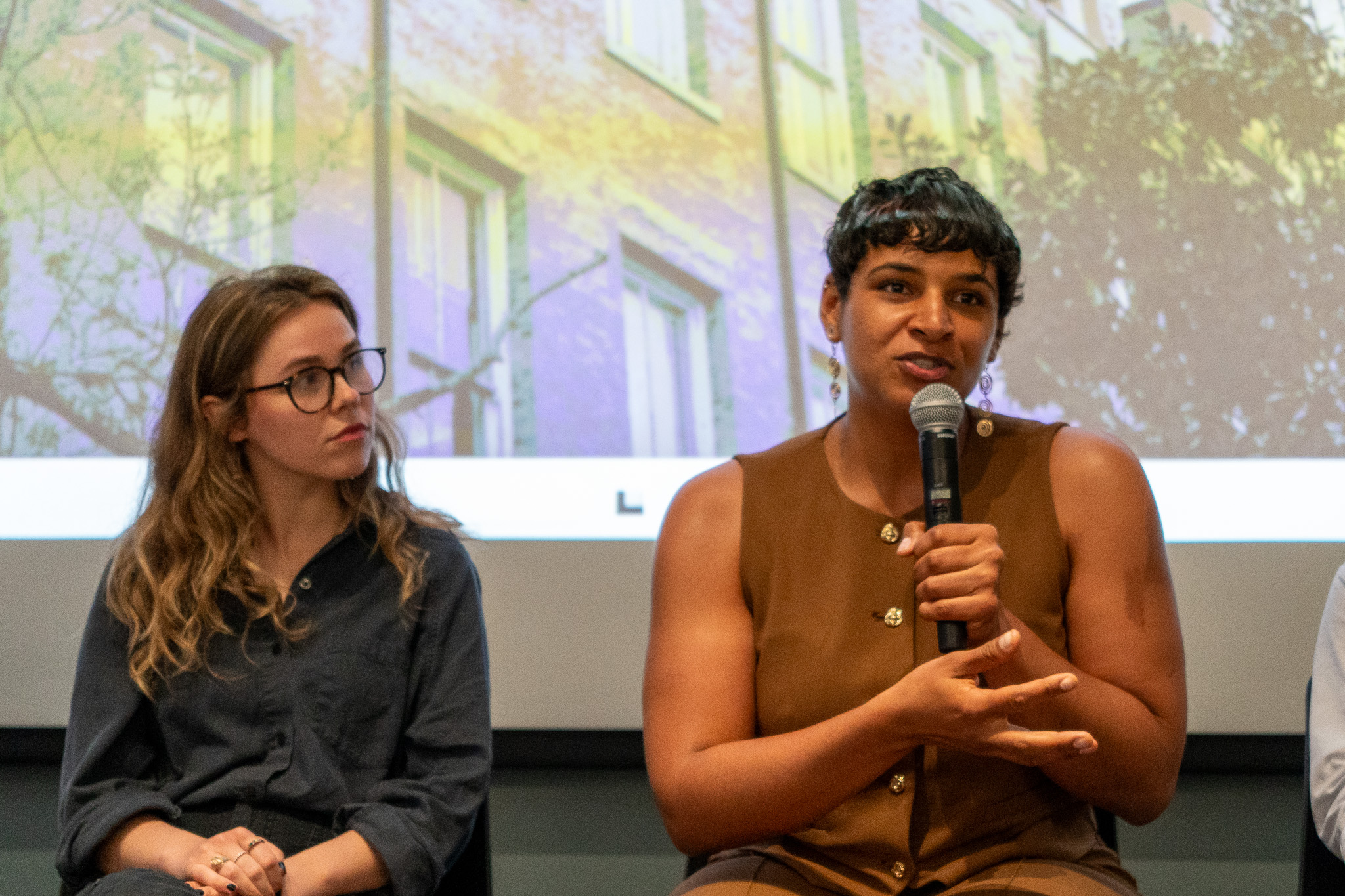 Person answers questions at presentation