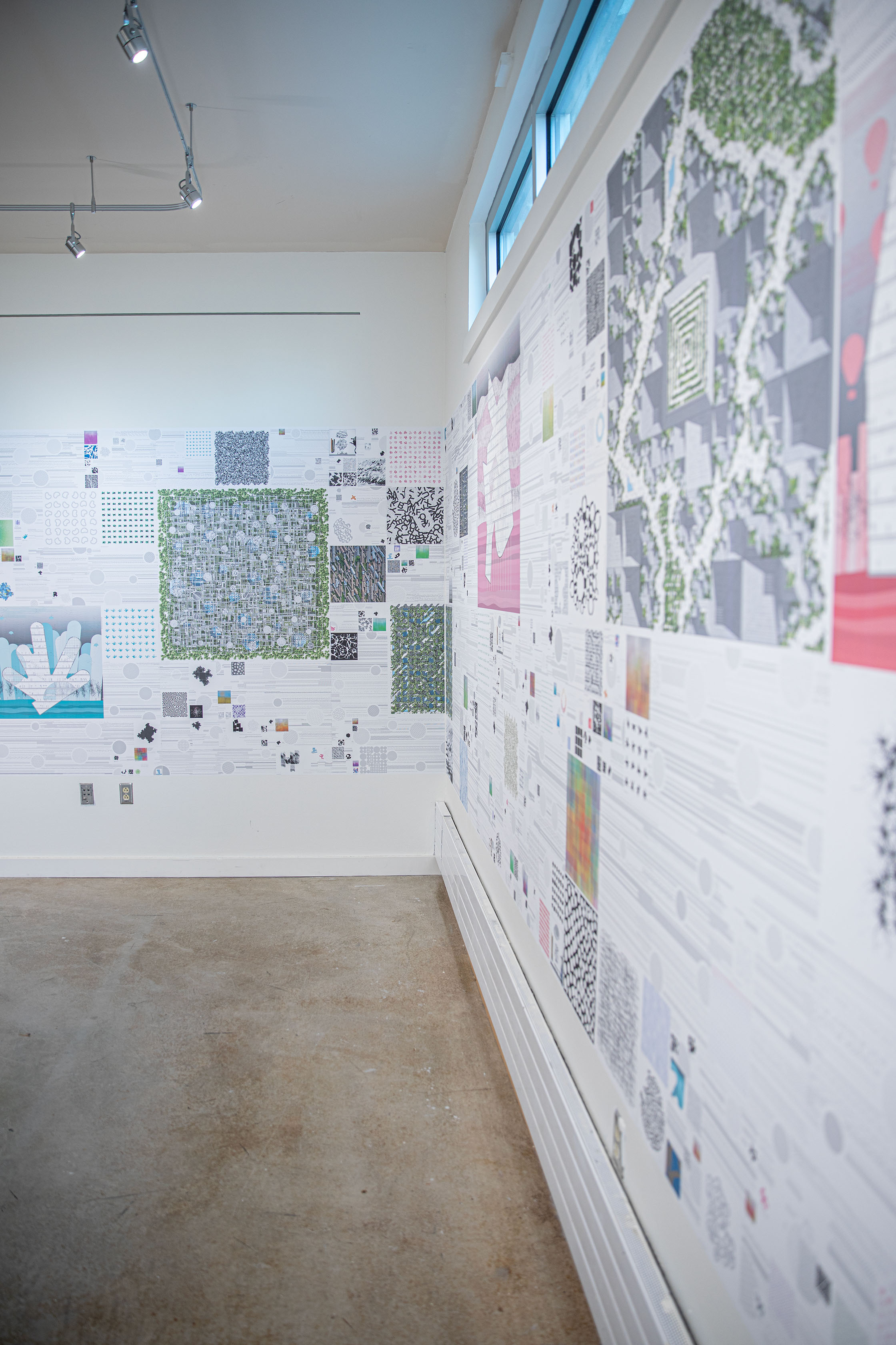 Corner of room showing part of Adam Marcus's exhibition on the walls