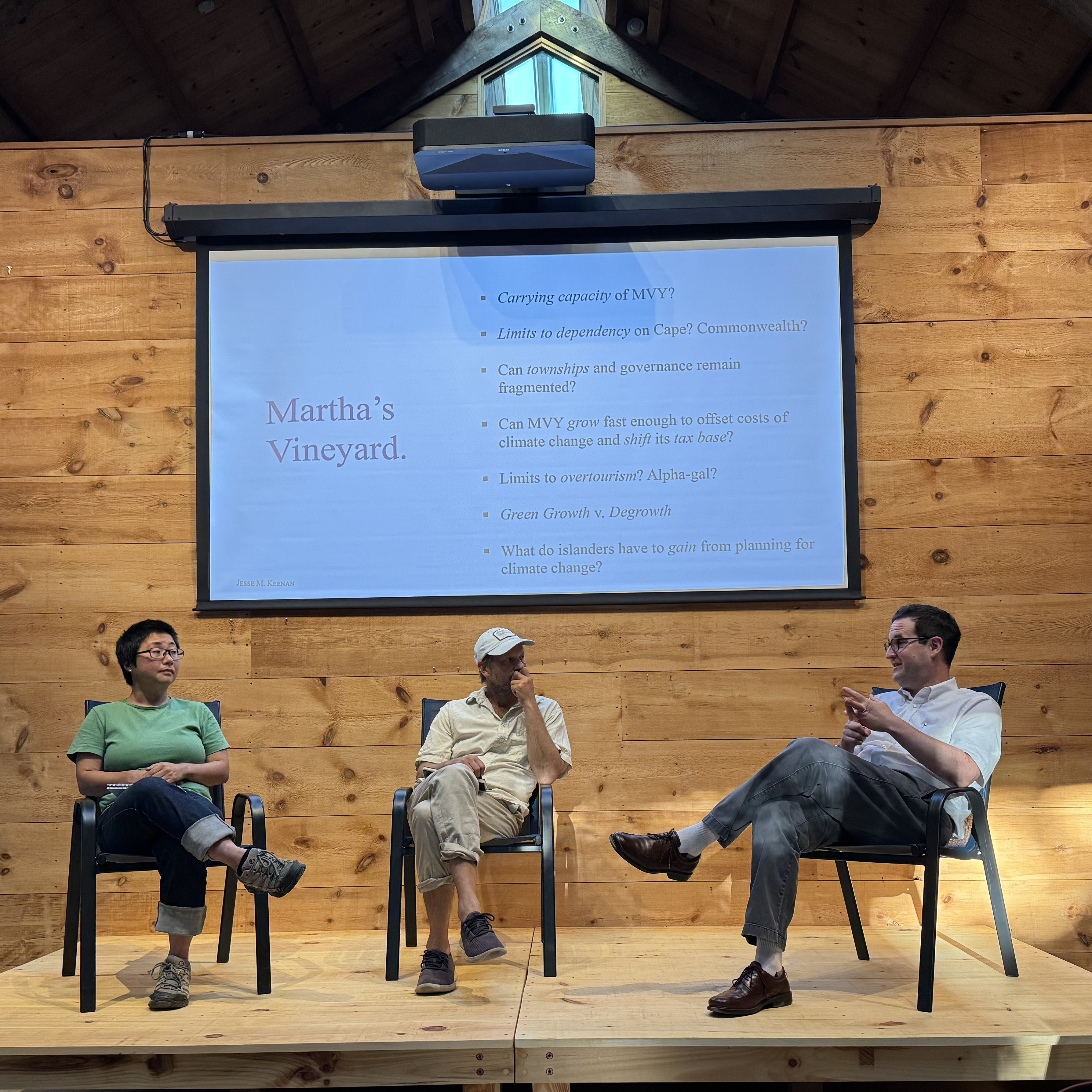 panel including author Jesse Keenan in front of a projected presentation
