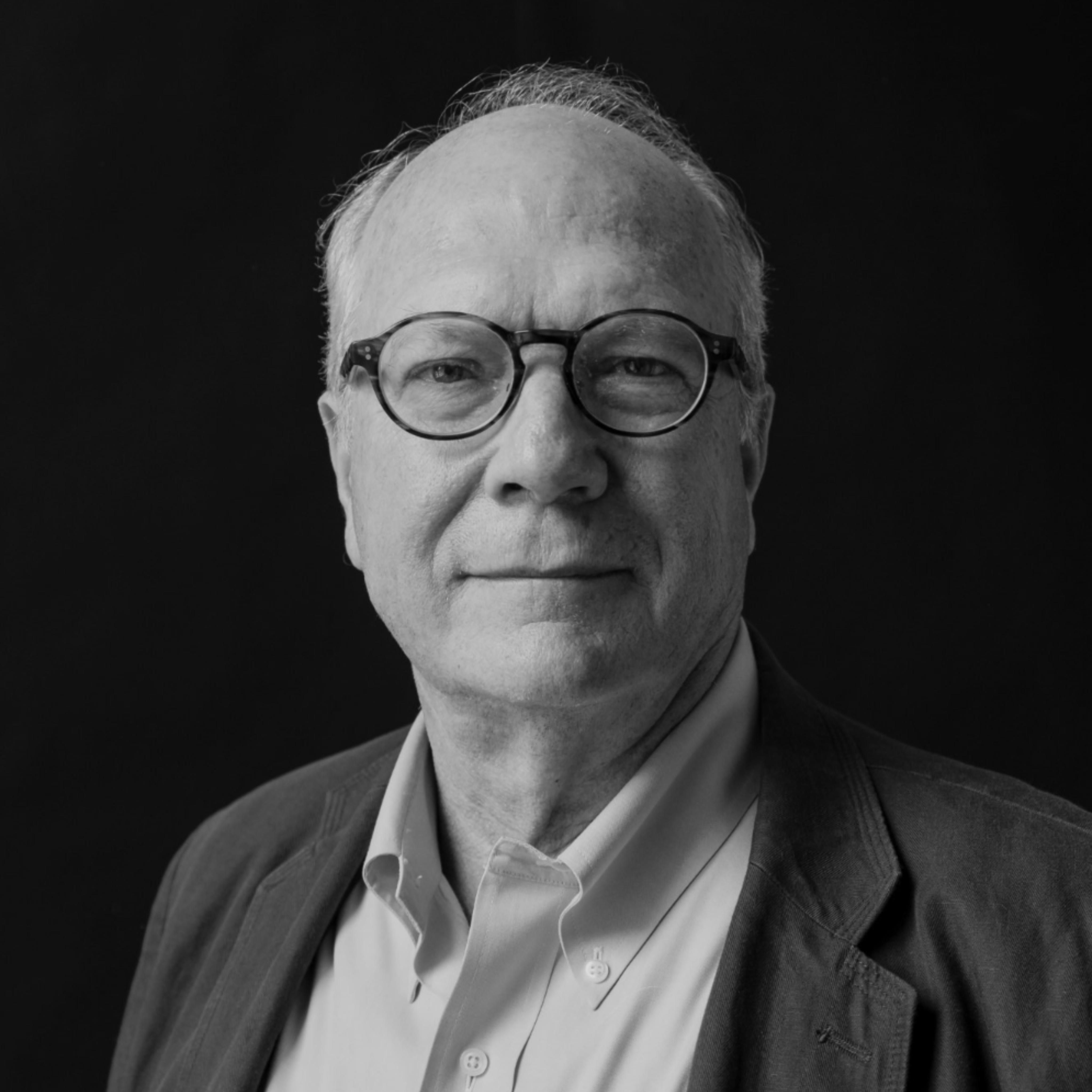 Black and white headshot of John Stubbs