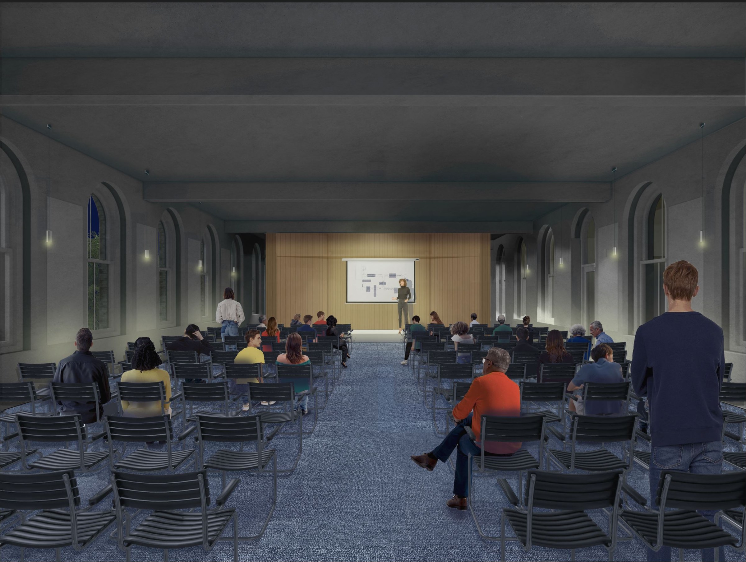 Interior perspective render of a large lecture hall with the lights off, looking at the stage from the back of the room with several rows of chairs in front of the stage