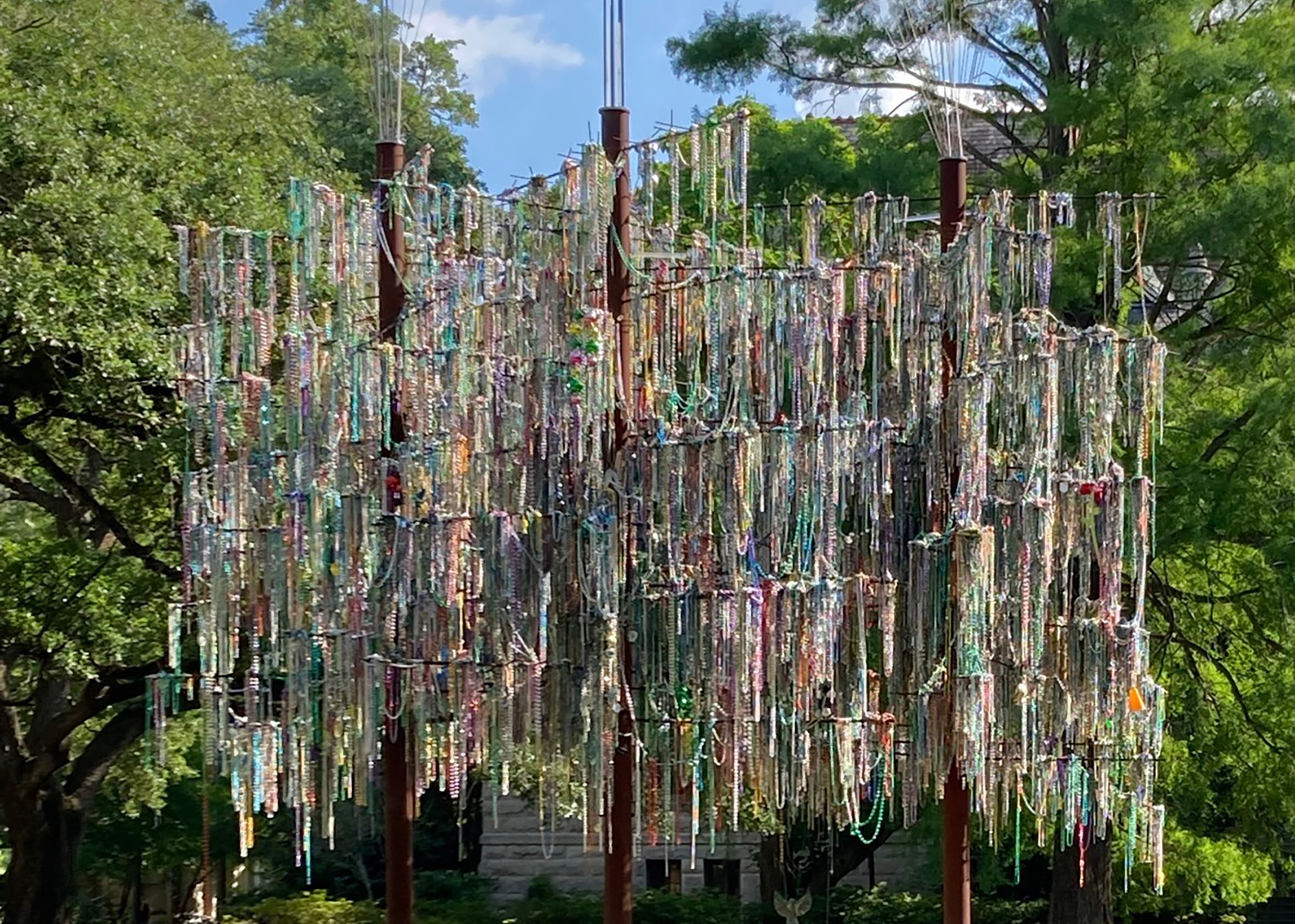 Photo of three new bead tree sculptures on Tulane's uptown campus