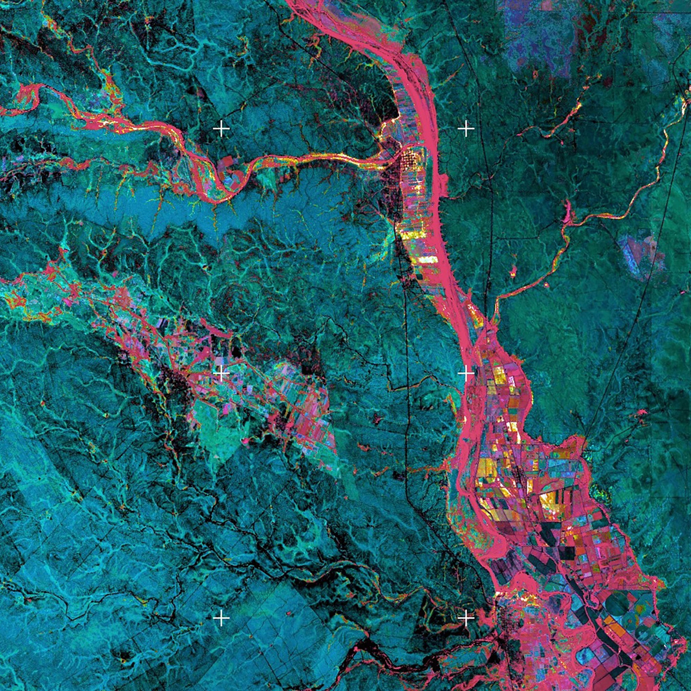 Teal landscape map with pink crack through the image