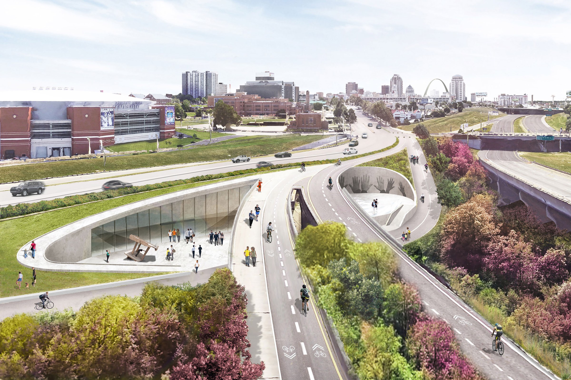 Aerial shot of bike pathways with city scape in the distance 