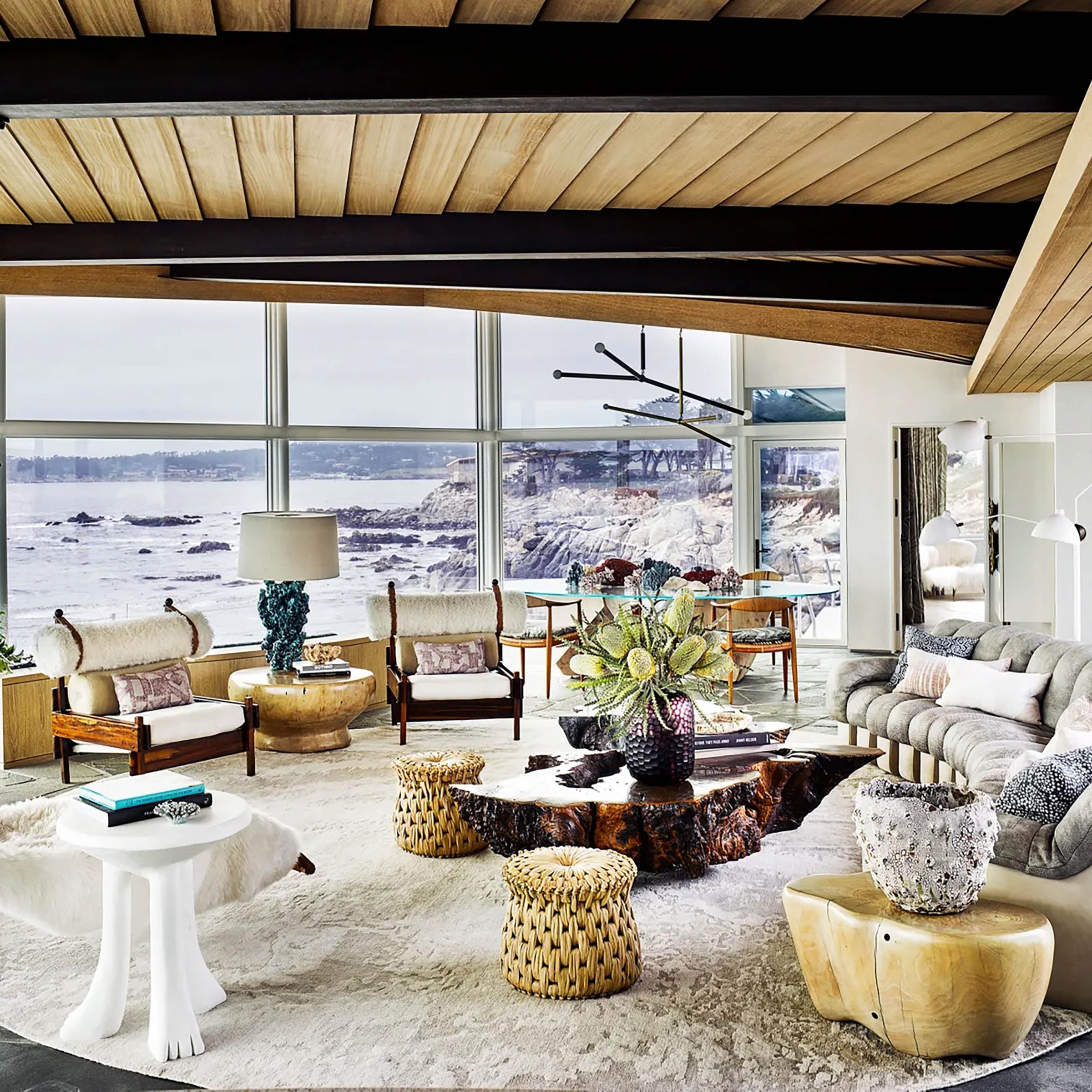 Modern living room with view looking out on the ocean 