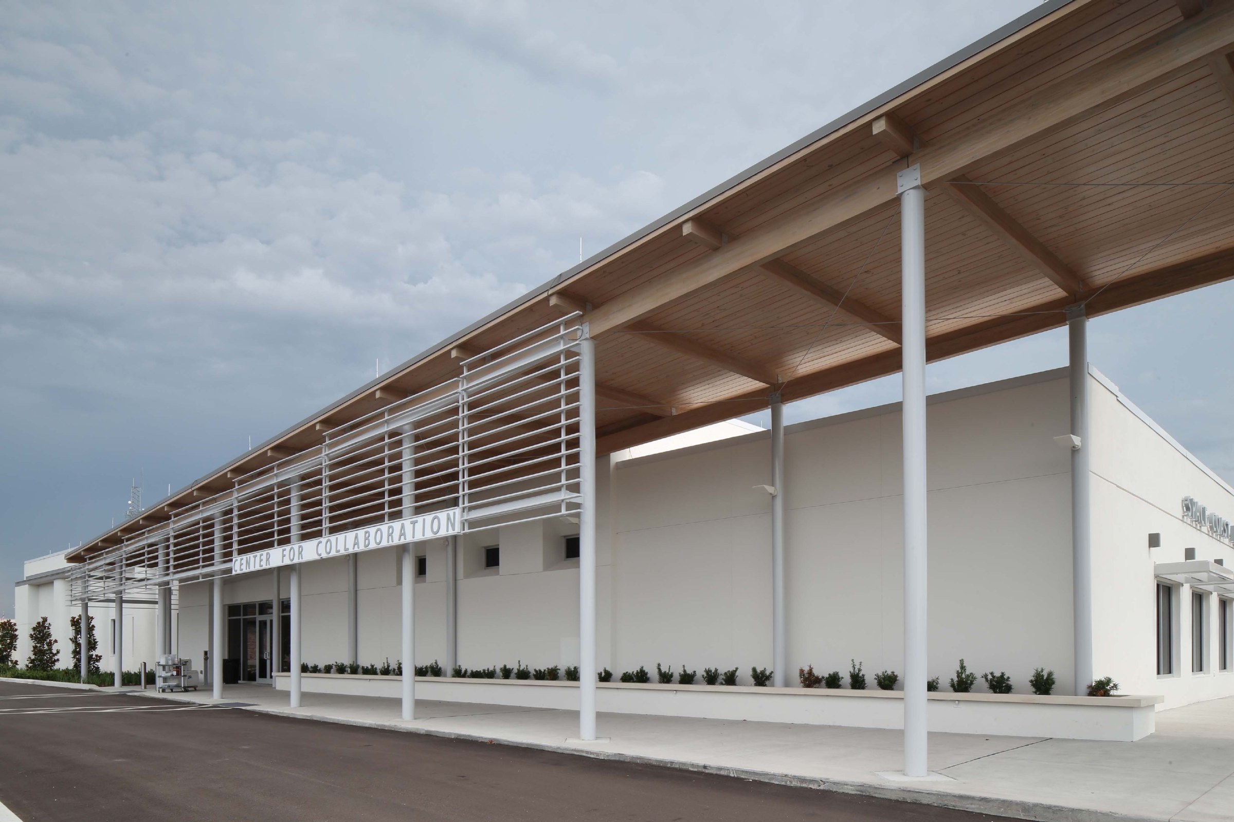 exterior image of The Center for Collaboration, an adaptive reuse of a defunct bowling alley and hosts many community events. 