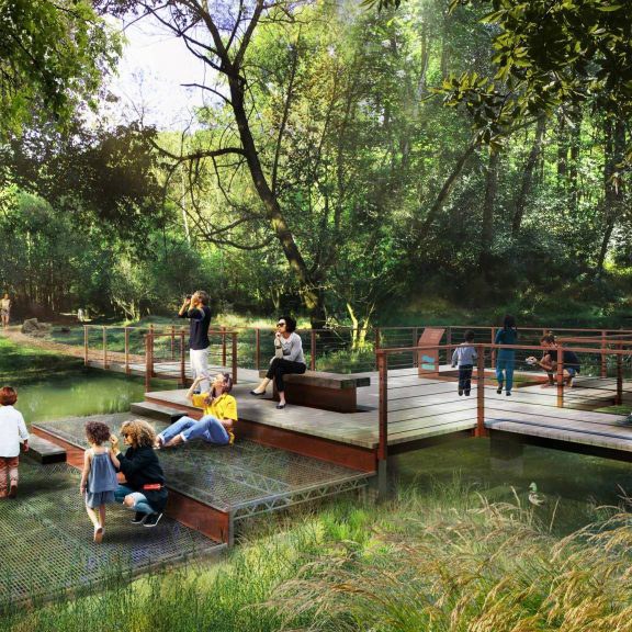 rendering of a green park with boardwalk and people sitting
