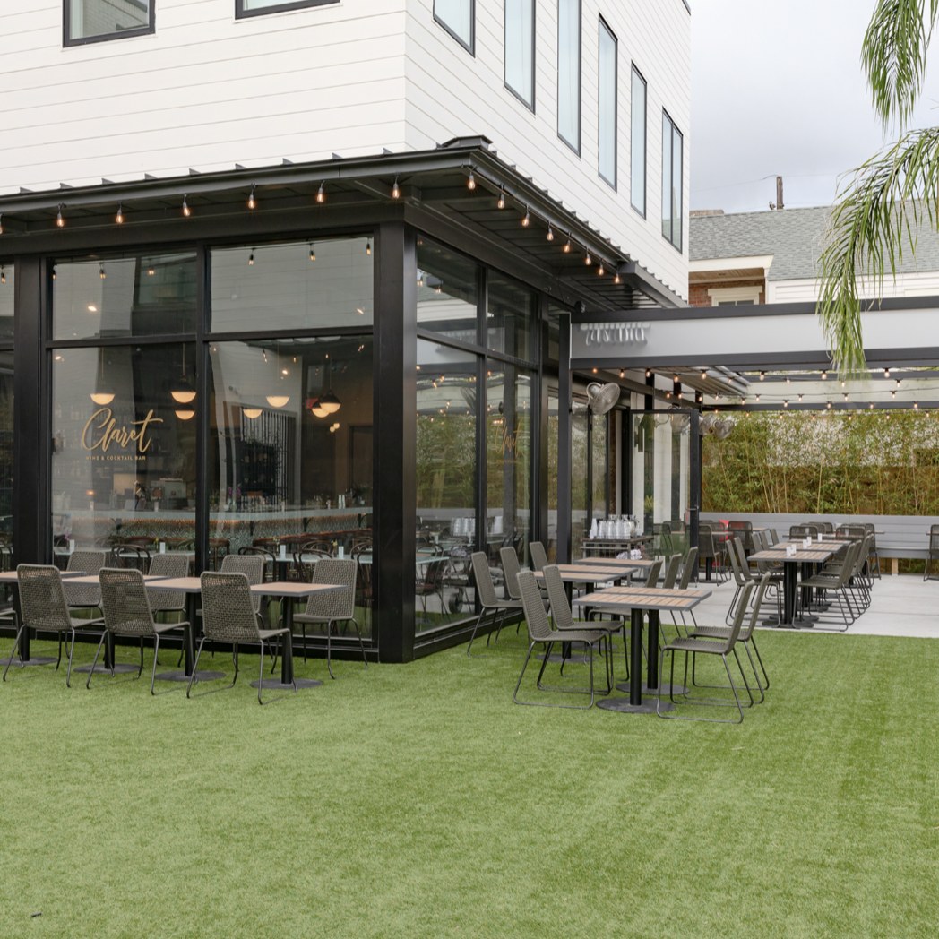 image of a wine bar with dark glass and outdoor seating