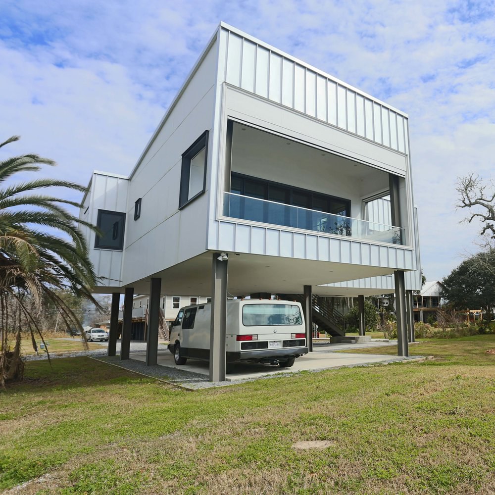 image of two story building on stilts