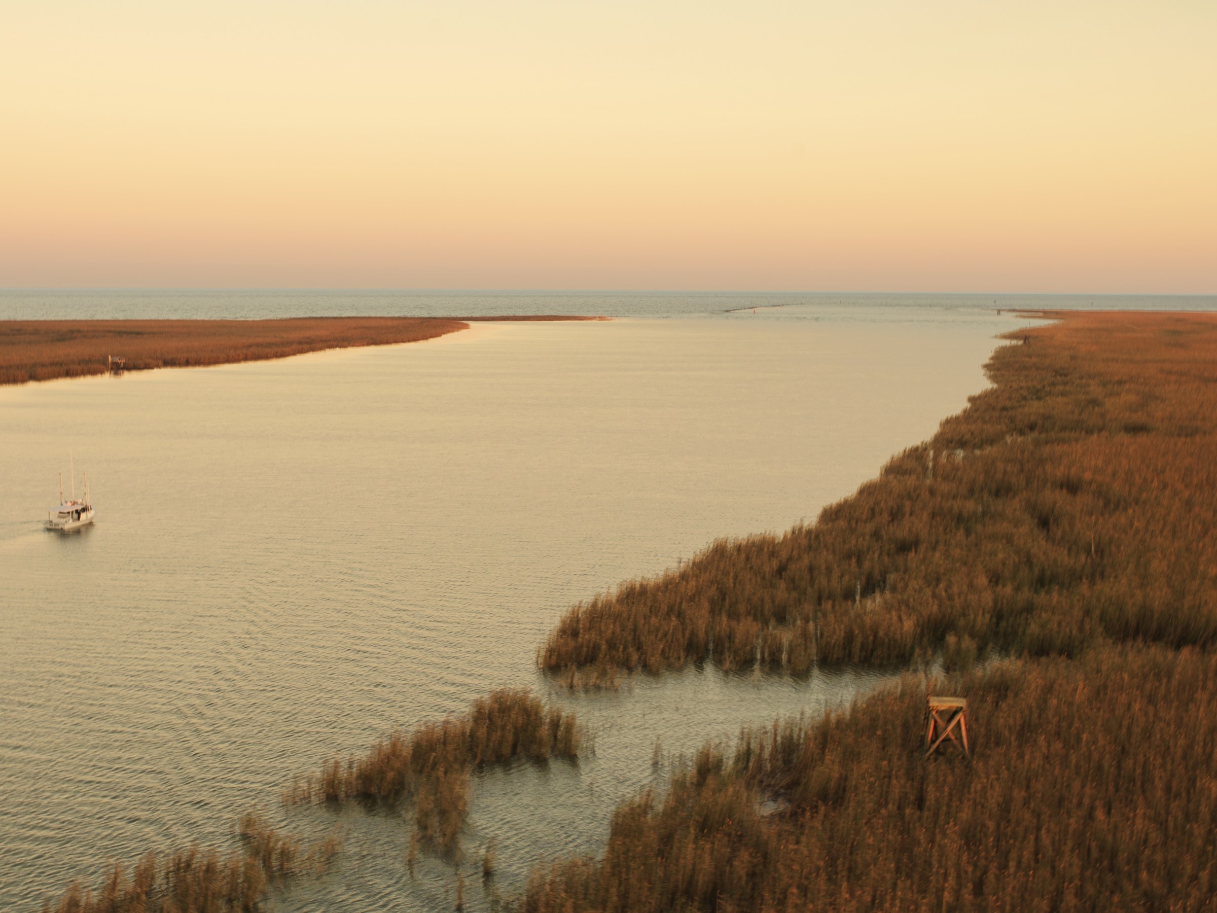 landscape image of the Mississppi river at sunset