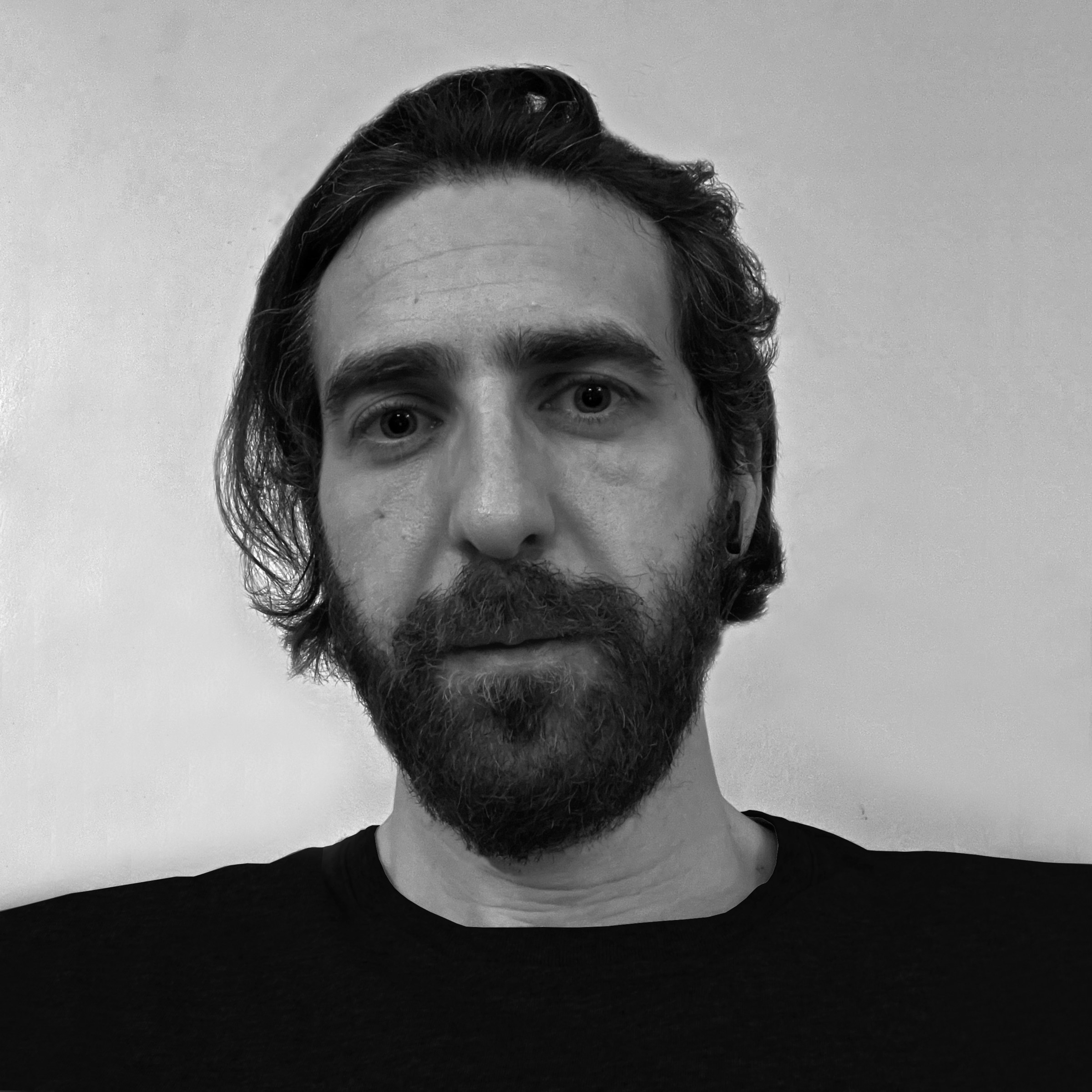 headshot of Emek Erdolu
