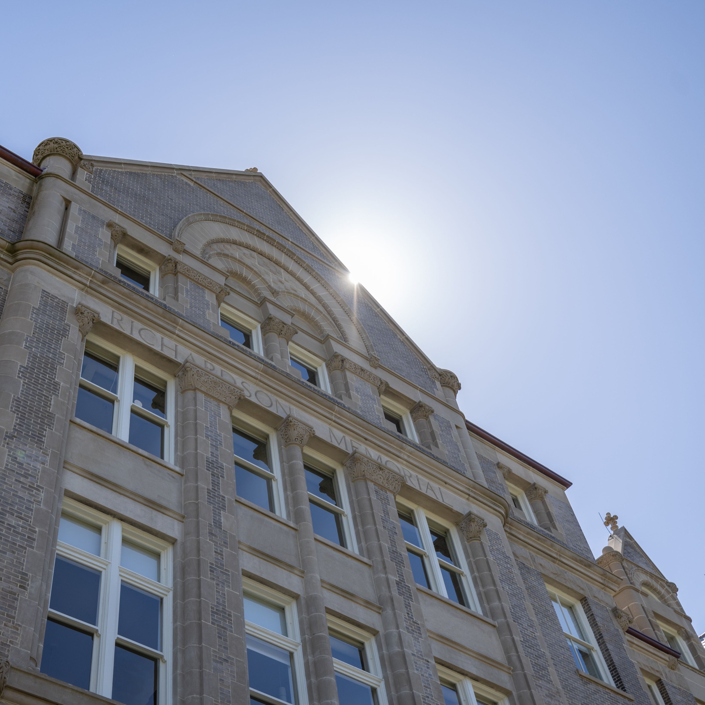 Facade of Richardson Memorial Hall, view looking up toward the top, fifth floor.