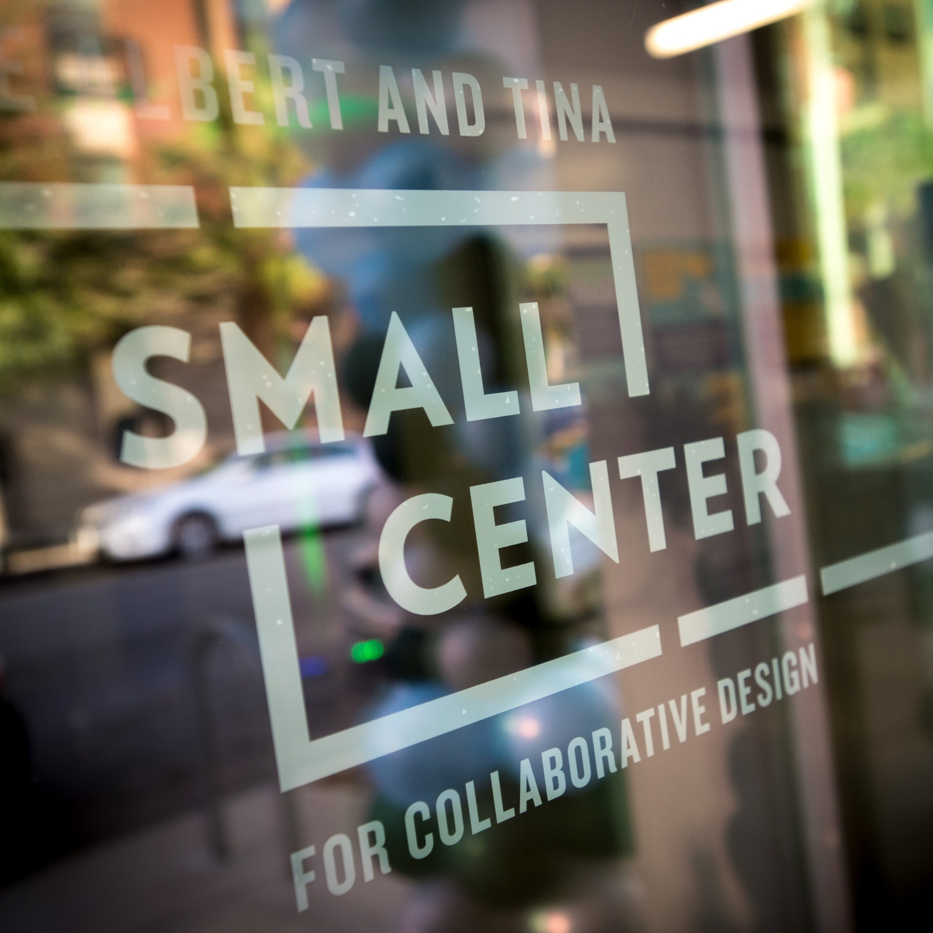Close-up of front glass window door of the Albert and Tina Small Center.