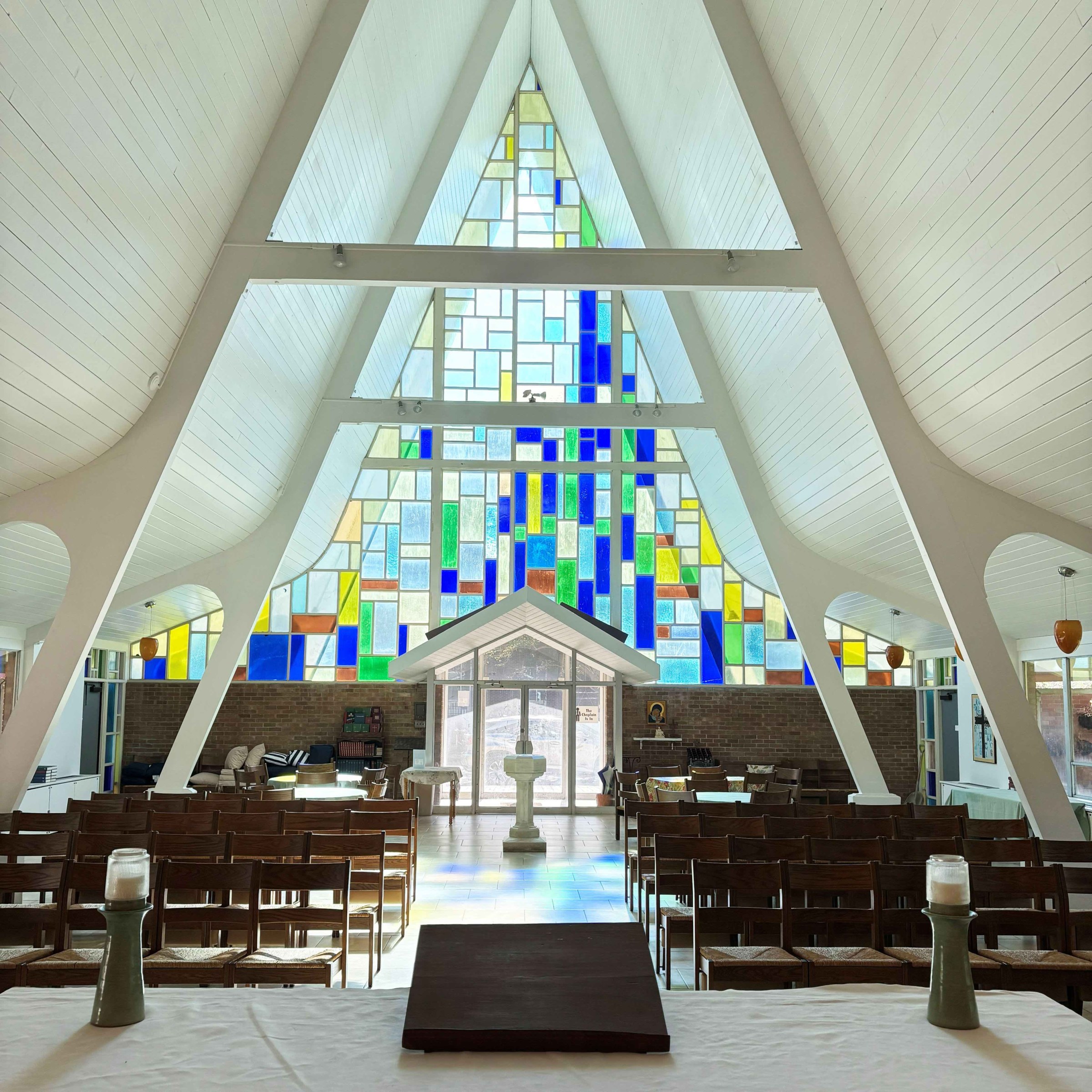 Interior of site of worship with stained glass 