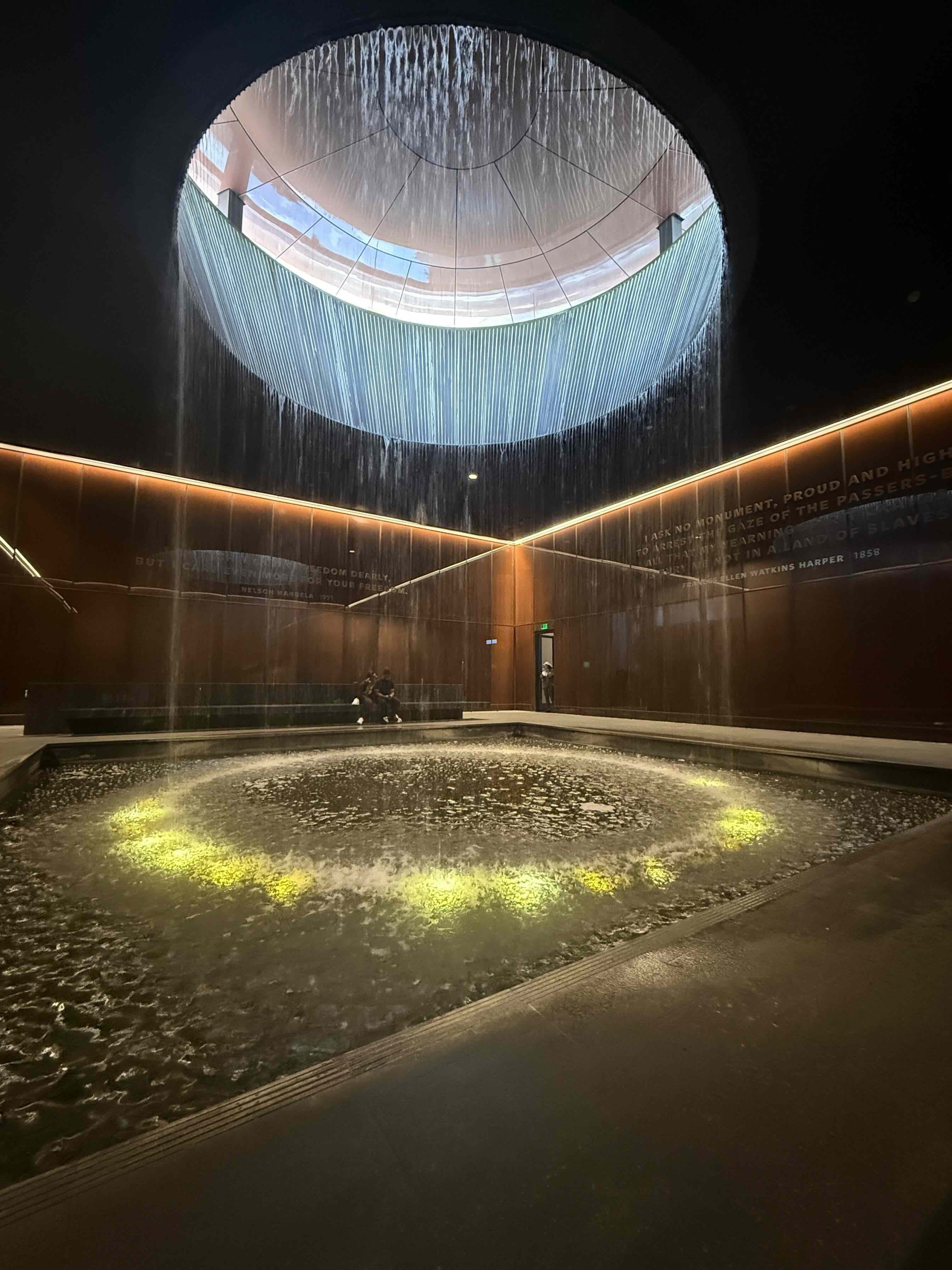 The Contemplative Court a fountain streaming down from an open space