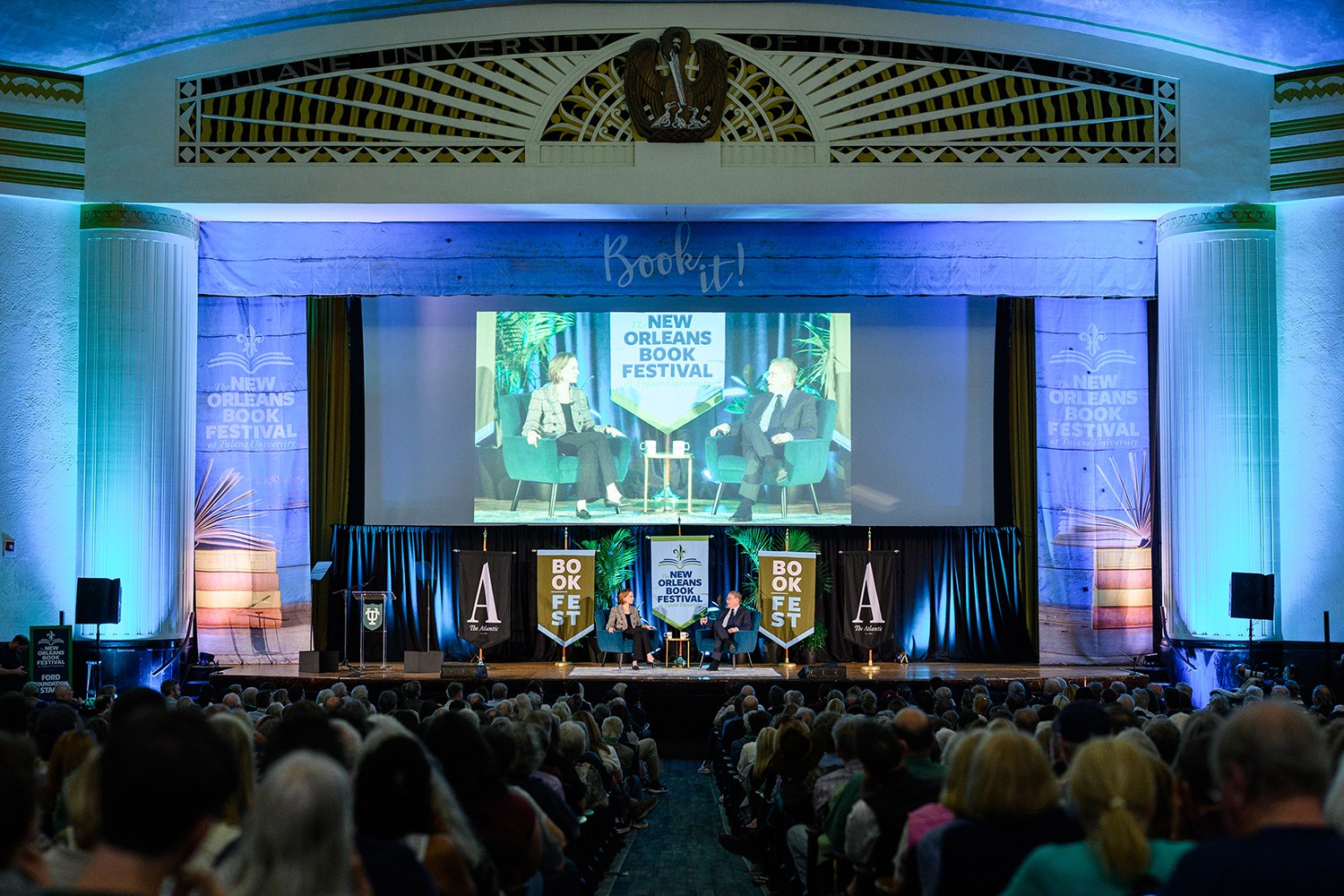 speakers on the stage at new orleans book festival